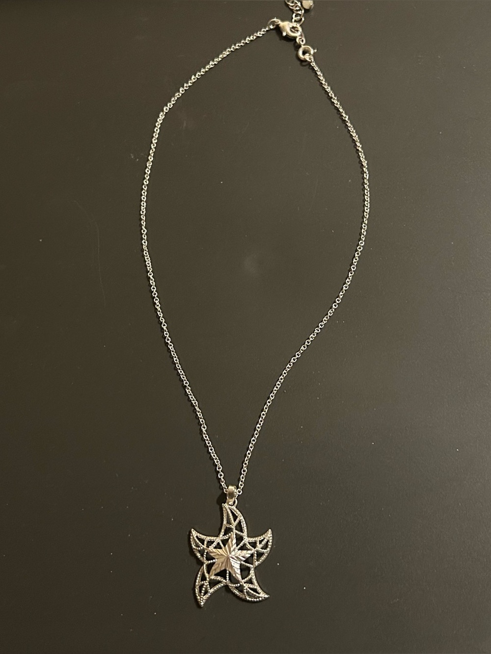 silver necklace with starfish pendant